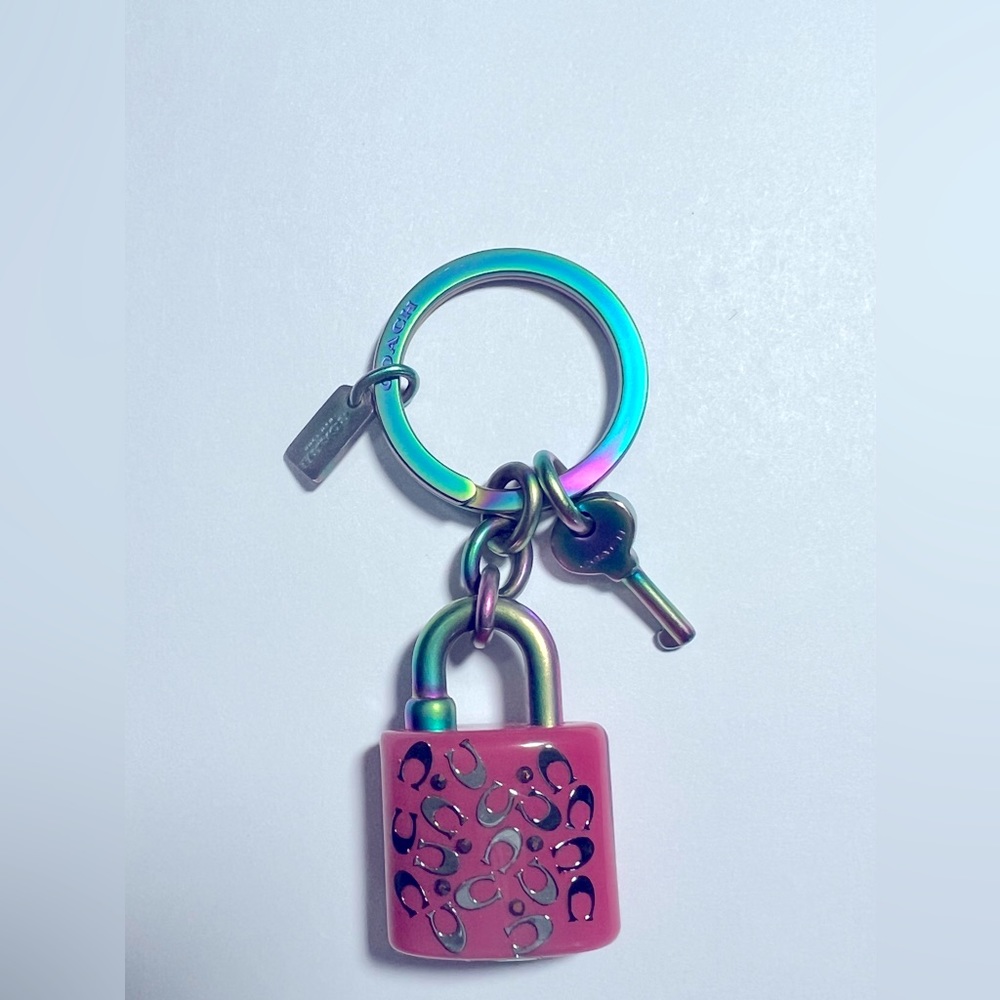 A BRAND NEW Coach Pink Lock Hologram Key Ring Bag Charm